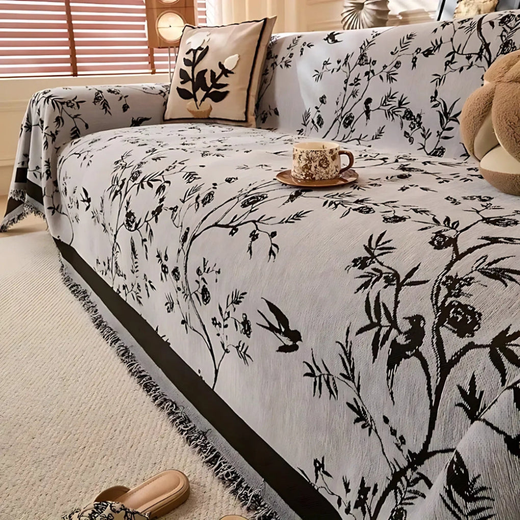 Elegante coperta con motivo floreale e frange