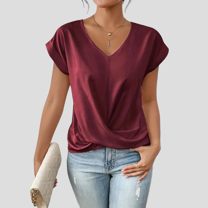 Camicetta da donna con scollo a V e orlo drappeggiato