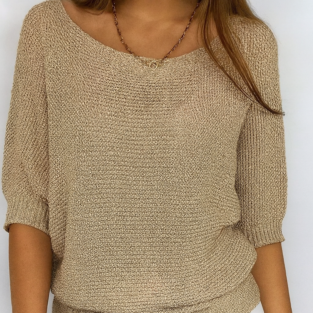 Maglione girocollo dorato a mezza manica