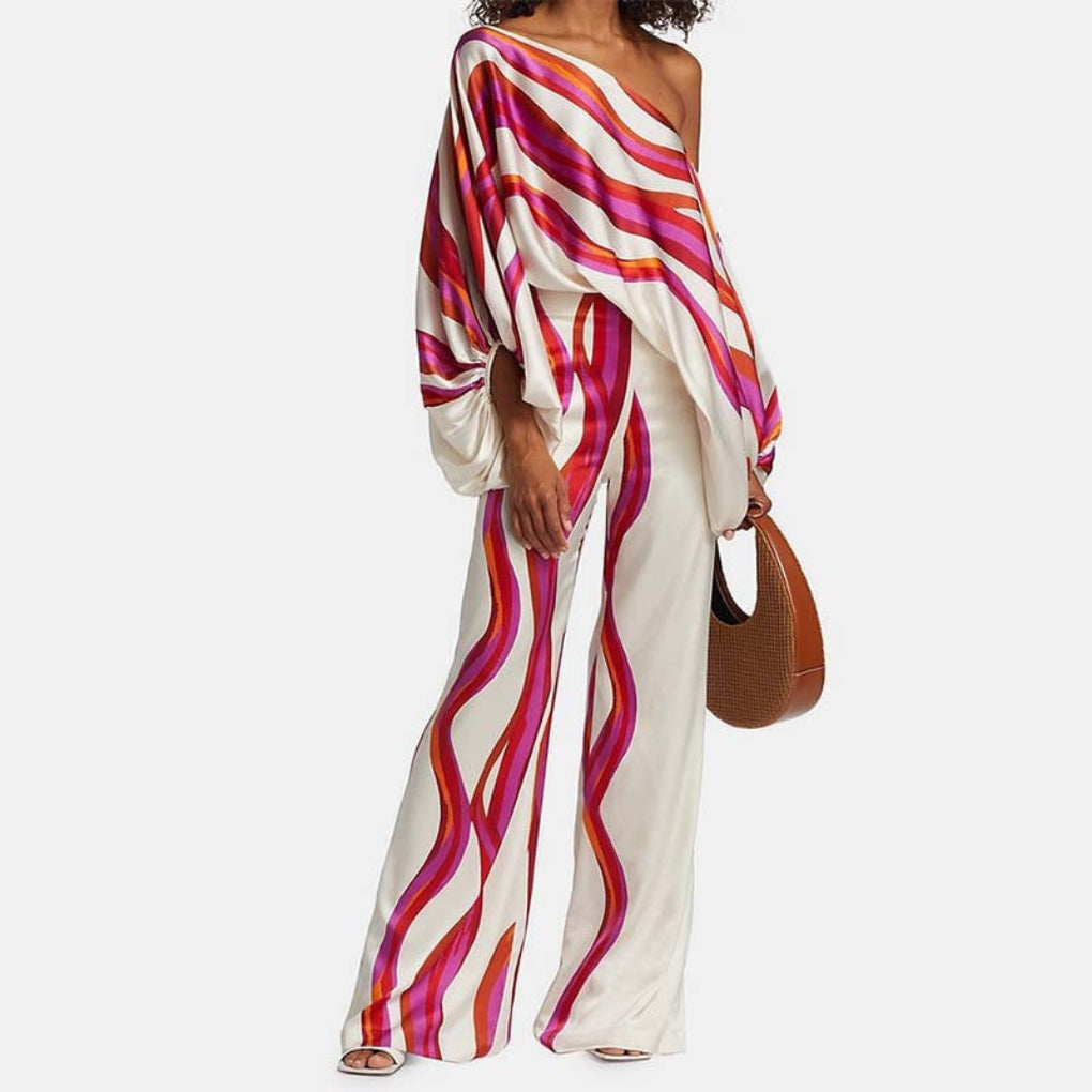 Completo due pezzi da donna con design floreale in grassetto
