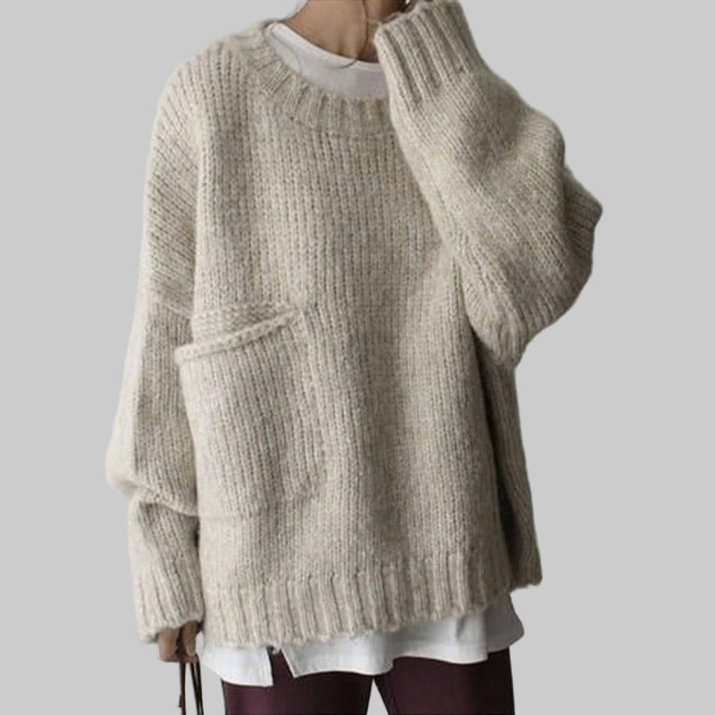 Maglione oversize color avorio con tasca frontale