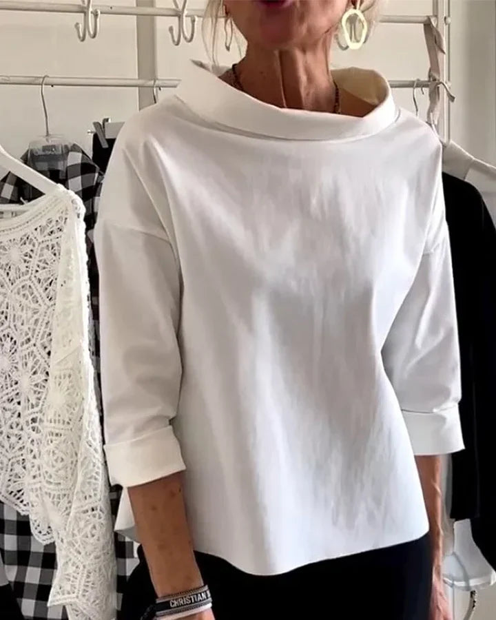 Top casual con ampi risvolti e mezzo dolcevita