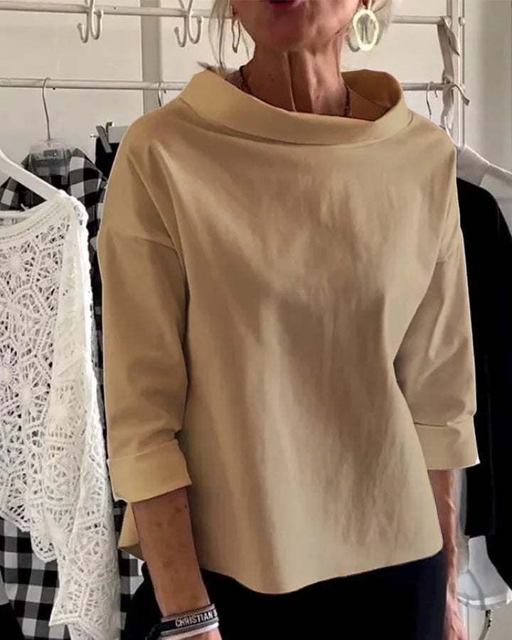 Top casual con ampi risvolti e mezzo dolcevita