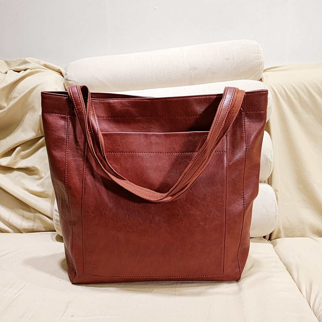 Borsa a mano elegante in morbida pelle da donna