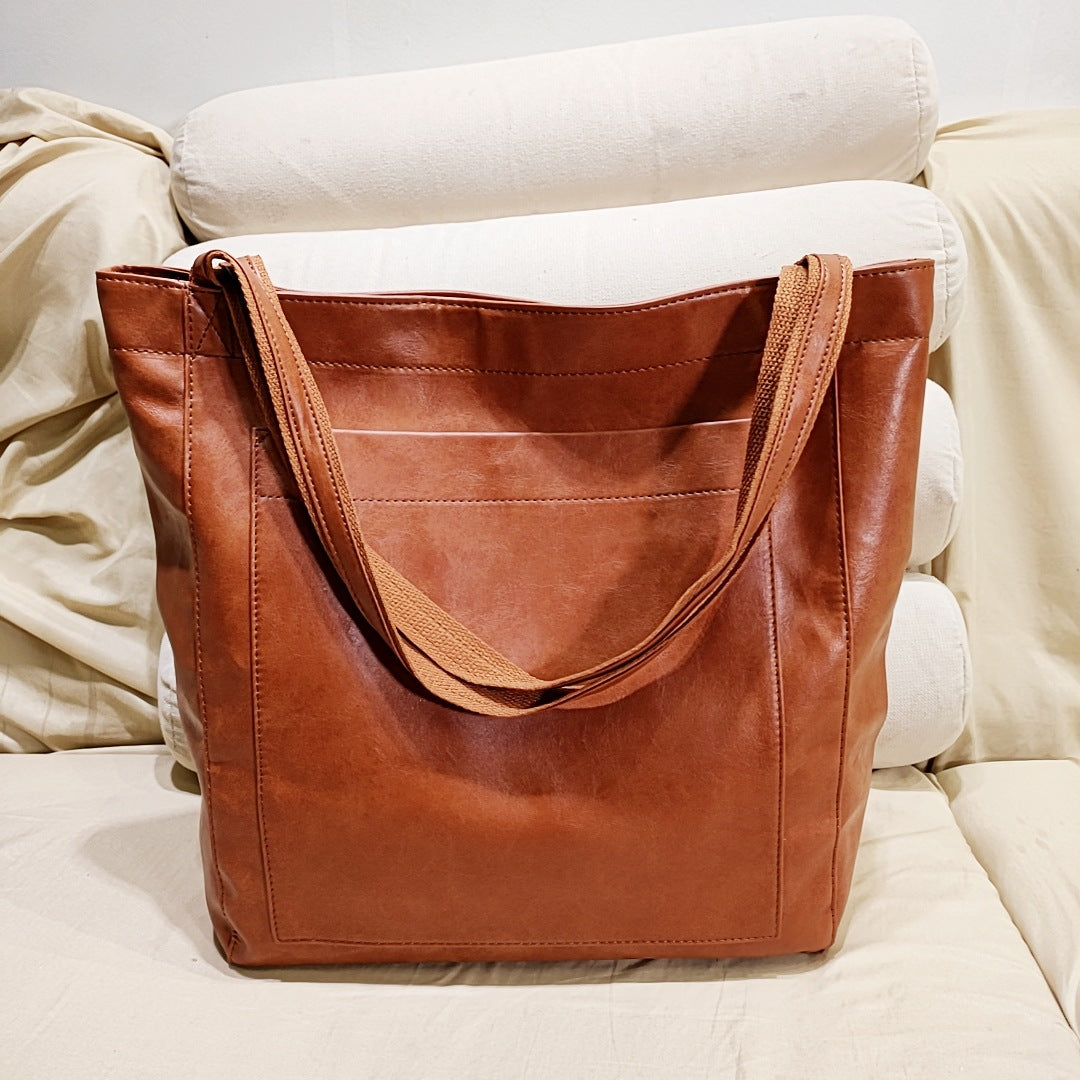Borsa a mano elegante in morbida pelle da donna