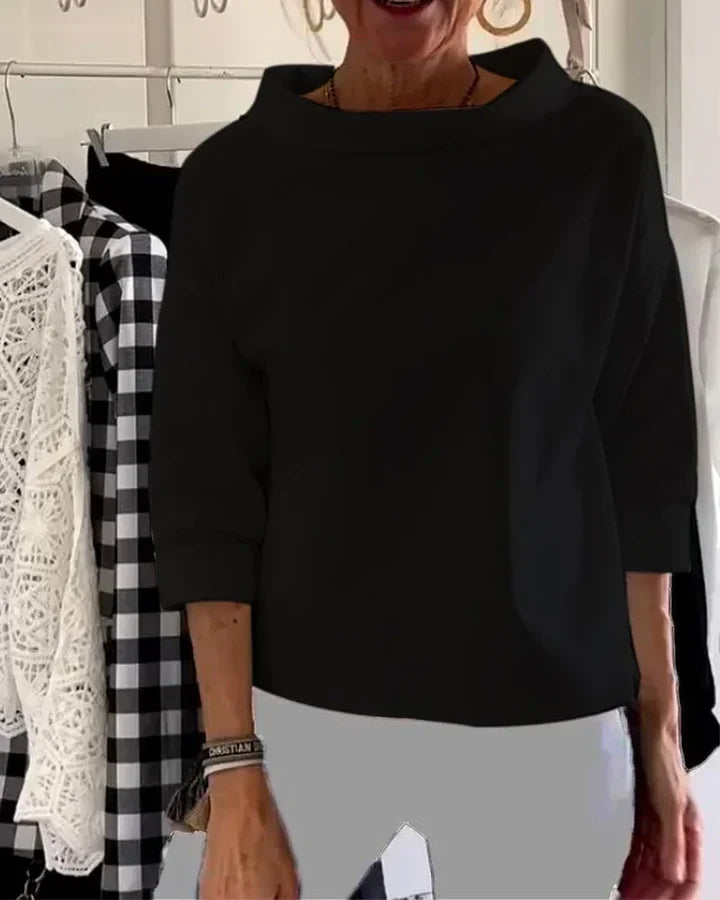 Top casual con ampi risvolti e mezzo dolcevita