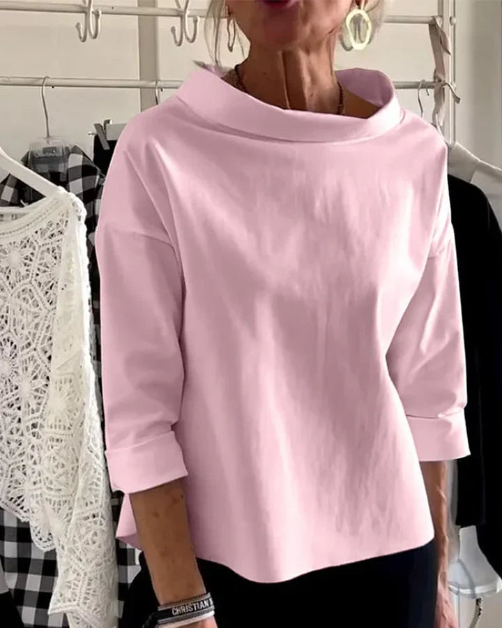 Top casual con ampi risvolti e mezzo dolcevita