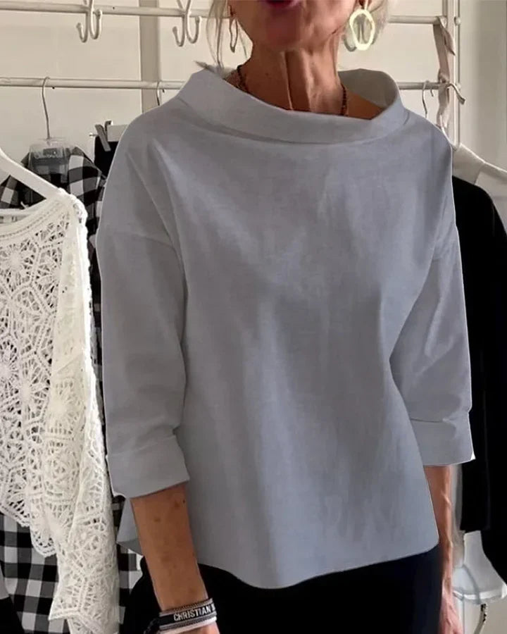 Top casual con ampi risvolti e mezzo dolcevita