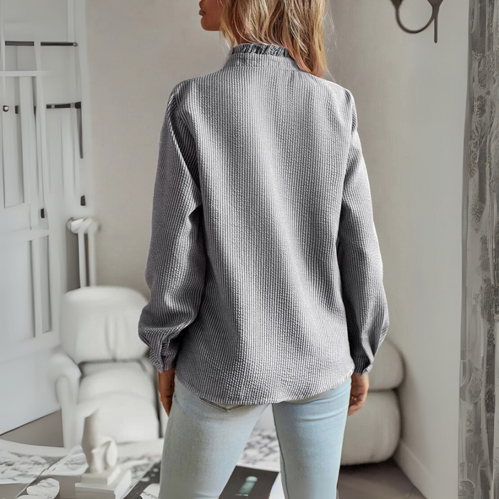 Elegante camicetta a maniche lunghe