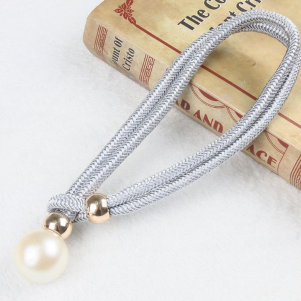 Set di 2 eleganti fermatende con perle