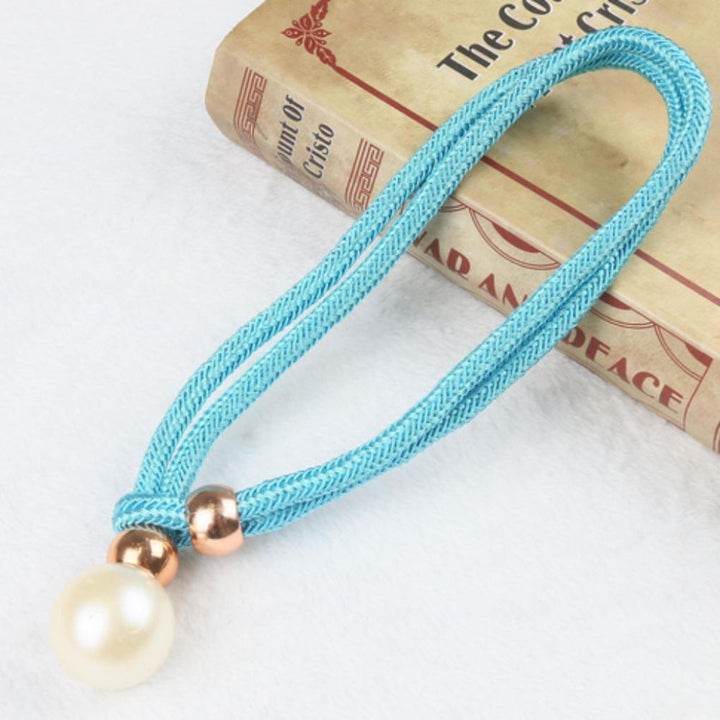 Set di 2 eleganti fermatende con perle