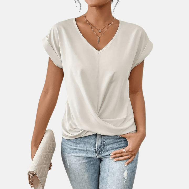 Camicetta da donna con scollo a V e orlo drappeggiato