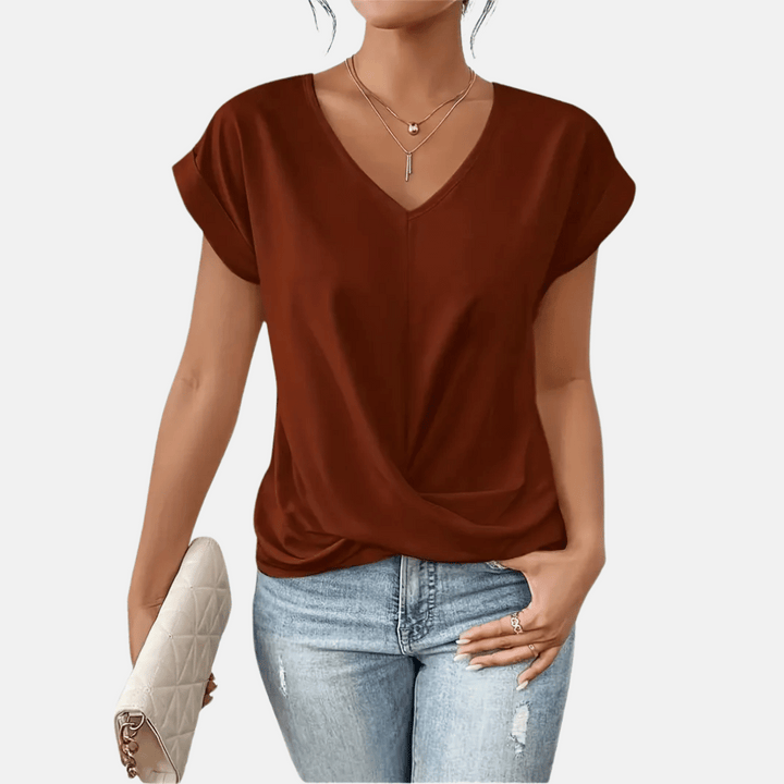 Camicetta da donna con scollo a V e orlo drappeggiato