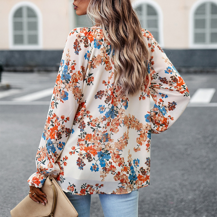 Camicetta con stampa floreale e scollo a V per donna