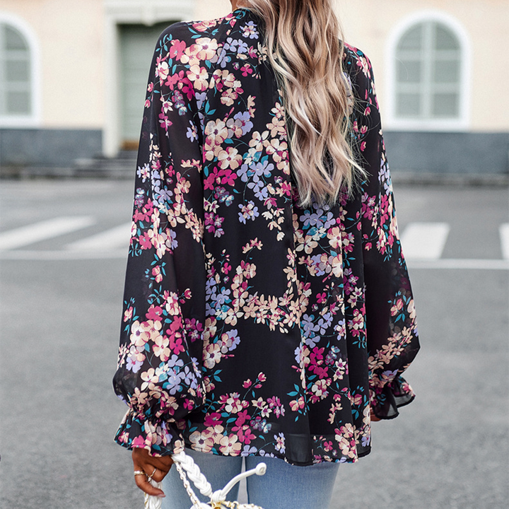 Camicetta con stampa floreale e scollo a V per donna