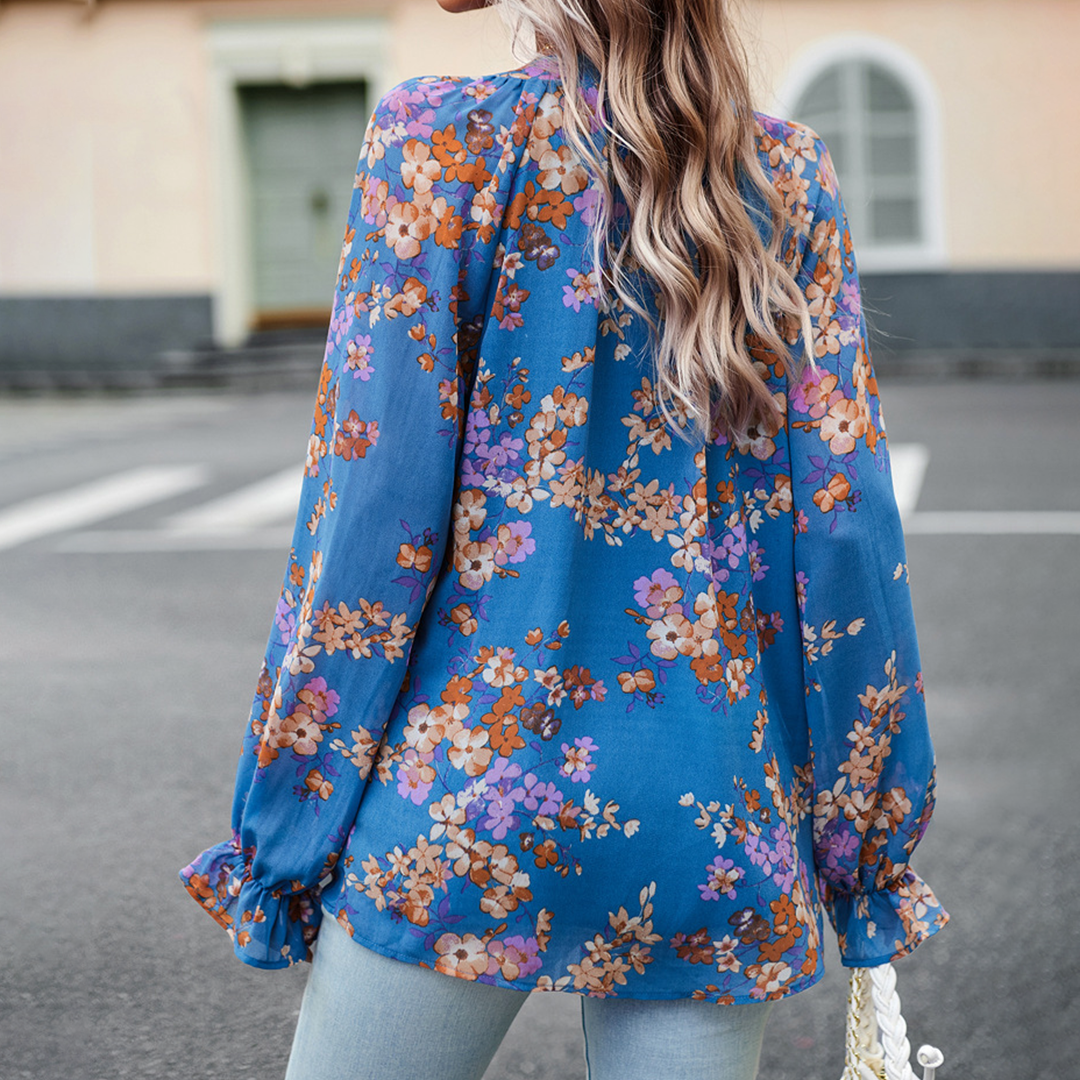 Camicetta con stampa floreale e scollo a V per donna