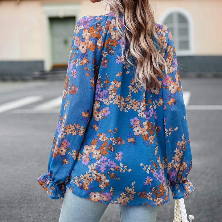 Camicetta con stampa floreale e scollo a V per donna