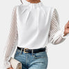 Top elegante da donna a maniche lunghe