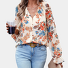 Camicetta floreale con scollo a V per donna