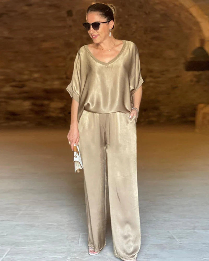 Elegante set da donna a due pezzi (top e pantaloni)
