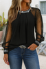 Top in rete con paillettes