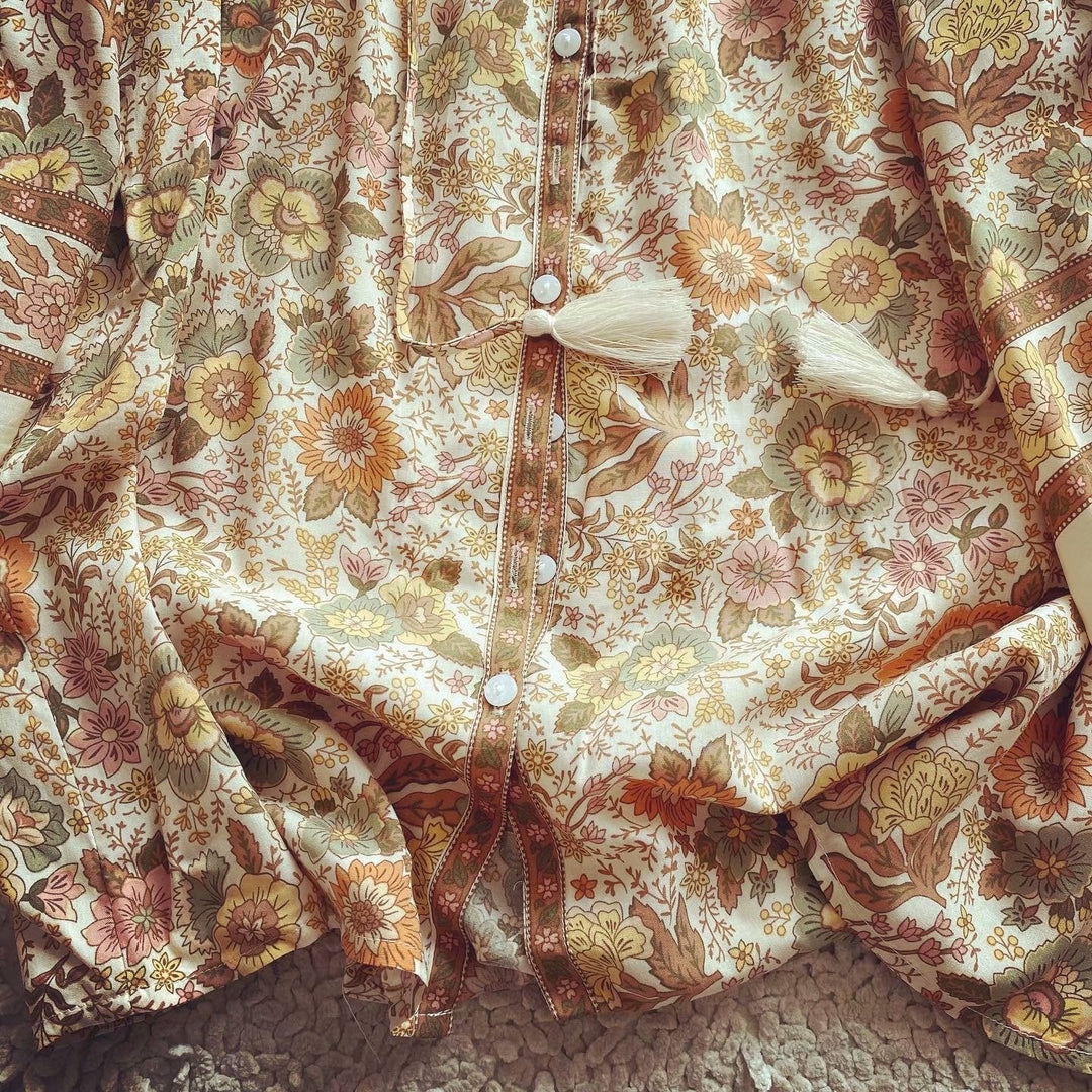 Camicetta bohémien con dettagli di nappe