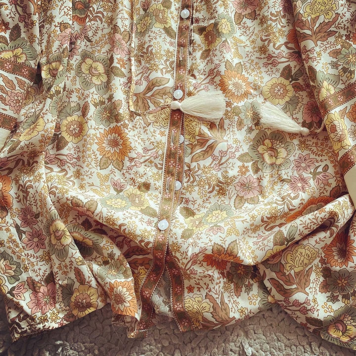 Camicetta bohémien con dettagli di nappe