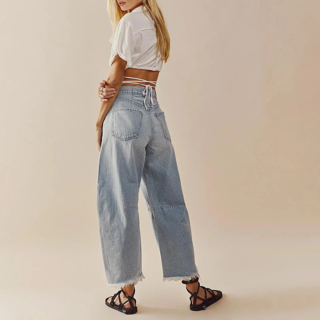 RelaxFit - Jeans Donna a Gamba Larga con Vita Alta e Orlo Sfilacciato