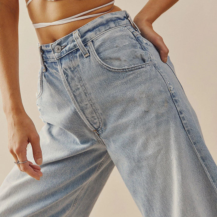 RelaxFit - Jeans Donna a Gamba Larga con Vita Alta e Orlo Sfilacciato