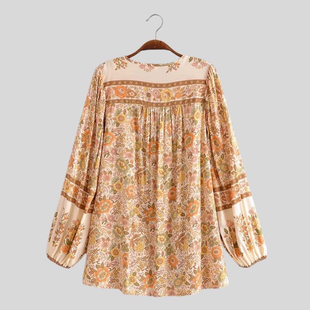 Camicetta bohémien con dettagli di nappe