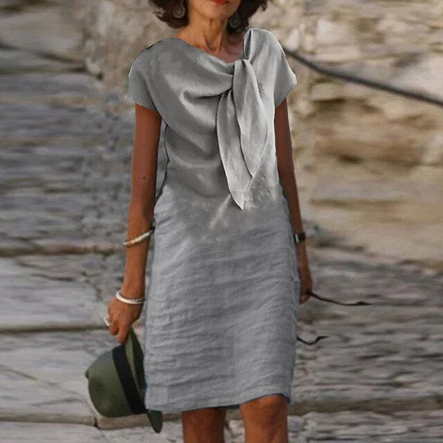 Tubino elegante da donna a maniche corte (lunghezza mini)