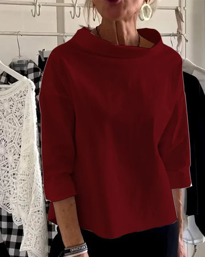 Top casual con ampi risvolti e mezzo dolcevita